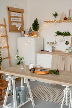 Merry Christmas and Happy New Year. beautiful cozy kitchen decorated for Christmas