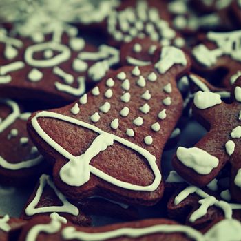 Christmas sweets. Beautiful hand decorated traditional Czech Christmas gingerbread cookies with icing.