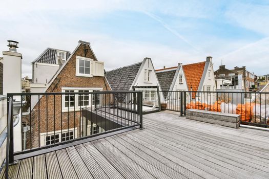 Stunning home roof with wood flooring and comfortable railings
