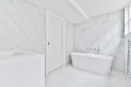 Interior design of an elegant white bathtub