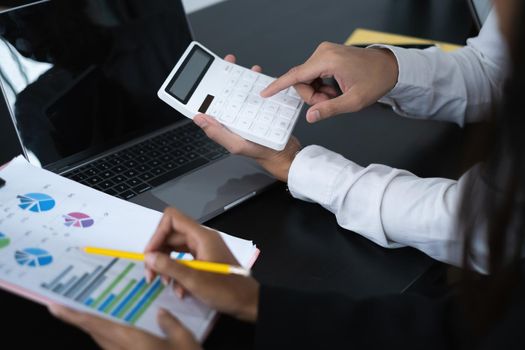 Businessman and Accountant brainstorming or discussing about fund investment and finance