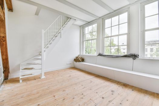 Magnificent bright room with a comfortable staircase