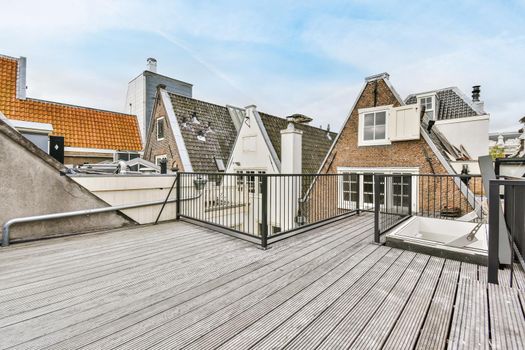Stunning home roof with wood flooring and comfortable railings