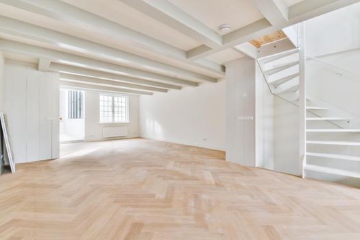 Magnificent bright room with a comfortable staircase