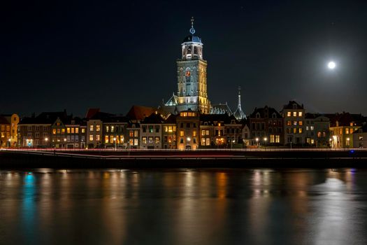 City scenic from Deventer at night with the Lebinius church in the Netherlands