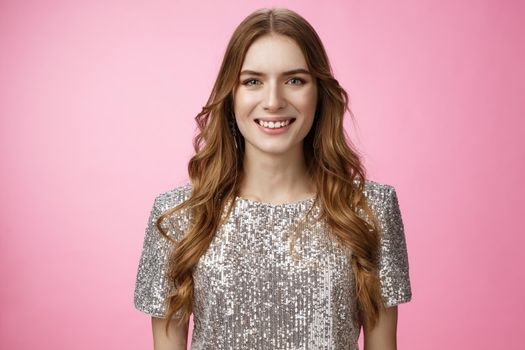 Close-up dreamy good-looking teenage cute girl wish become star smiling broadly happily gazing camera wearing glittering blouse ready rock-n-roll party, standing delighted carefree pink background.