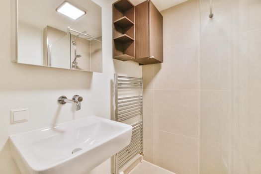 Bright stylish and comfortable bathroom design with shelves