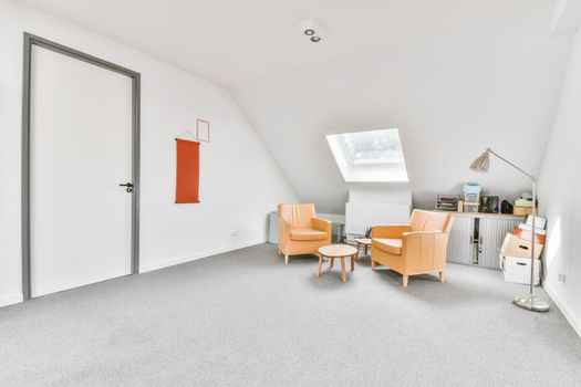 Cozy room with two soft yellow armchairs