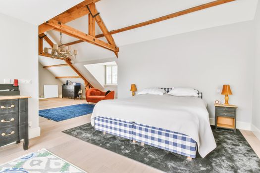 Bedroom in a minimalist style with a double bed