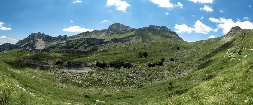The mountain pass Sedlo is in the north of Montenegro. Fantastic green view of Saddle mountain, Durmitor massive, Montenegro