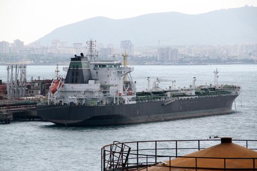 Large cargo ship docked in the city port