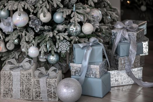 Presents and Gifts under Christmas Tree, Winter Holiday Concept.