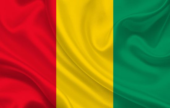 Guinea country flag on wavy silk fabric background panorama - illustration