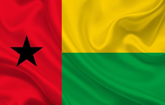 Guinea-Bissau country flag on wavy silk fabric background panorama - illustration