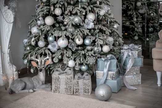 Presents and Gifts under Christmas Tree, Winter Holiday Concept.