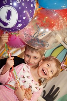 Children are happy at the birthday party. High quality photo