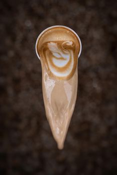 Coffee latte art Prepared and poured out by a barista.