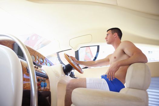 young happy man have fun on luxury boat yacht