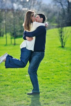 happy young couple have good time and fun outdoor at beautiful sunny day