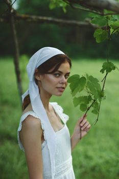woman outdoors in garden countryside ecology nature. High quality photo