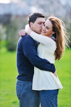 happy young couple have good time and fun outdoor at beautiful sunny day