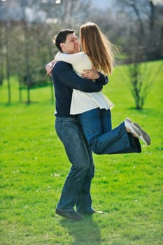 happy young couple have good time and fun outdoor at beautiful sunny day