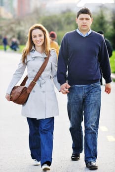 happy young couple have good time and fun outdoor at beautiful sunny day