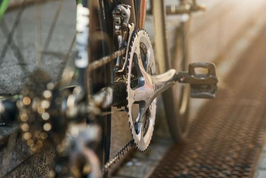 Detailed view of bicycle mechanisms. Sprocket, pedal and chain on a mountain bike. Selective focus