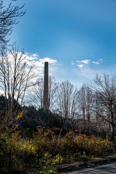 landscape of narni and its chimney of a factory in umbria
