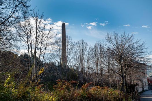 landscape of narni and its chimney of a factory in umbria