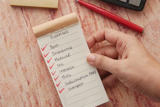 check mark on a check box on a paper .
