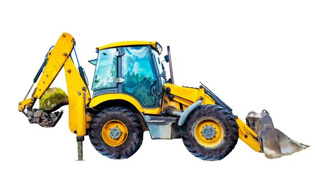 A large yellow multifunctional wheeled tractor isolated on white background. Yellow excavator lifts a stone