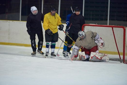 ice hockey goalkeeper  player on goal in action