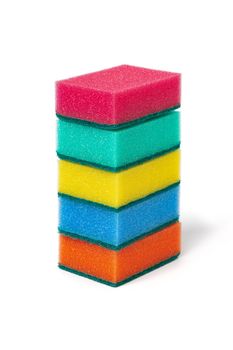 Set of different bright colored rectangular foam sponges for washing dishes and cleaning in kitchen on white background. Five sponges in pink, green, yellow, blue and orange colors. Close-up, vertical