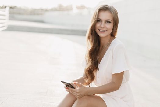 Happy woman with phone. High quality photo