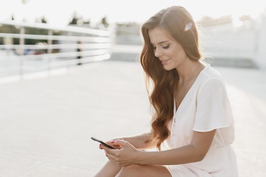 Happy woman with phone. High quality photo