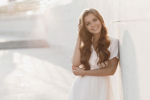 Young happy woman in hat outdoor. High quality photo