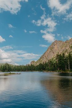 Majestic mountain lake. scenery of high mountain with lake and high peak.