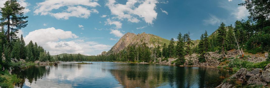 Majestic mountain lake. scenery of high mountain with lake and high peak.