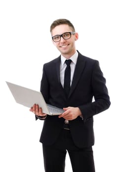 Businessman holding a laptop and smiling. Isolated against a white background.