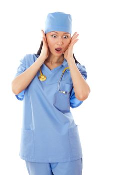 Full isolated studio picture from a young female doctor looking scared.