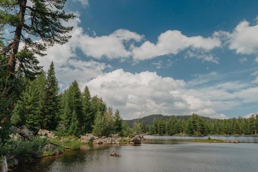 Majestic mountain lake. scenery of high mountain with lake and high peak.