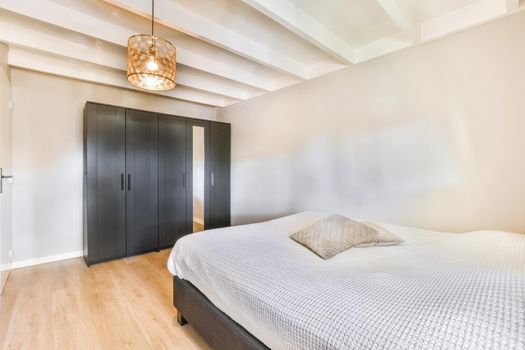 Stunning bedroom with elegant bed and throw pillows
