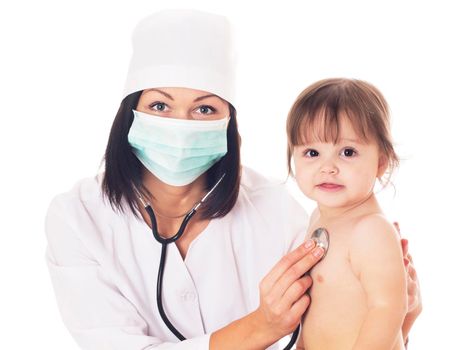 Young female Doctor checking baby with stethoscope on white background