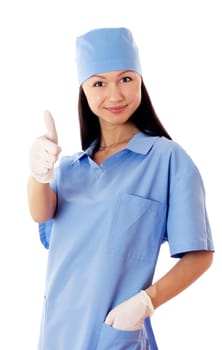 Full isolated studio picture of a young and beautiful smiling female doctor showing ok sign.