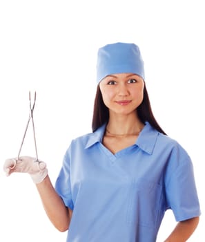 Full isolated studio picture from a young female doctor holding medicine scissors and smiling.