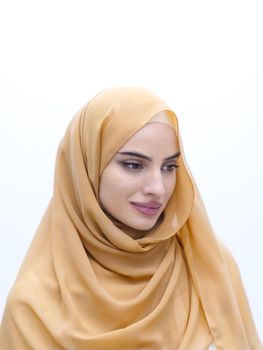 portrait of beautiful muslim woman in fashionable dress with hijab isolated on white background representing modern islam fashion and ramadan kareem concept