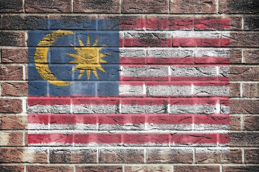 A Malaysia flag on old brick wall background