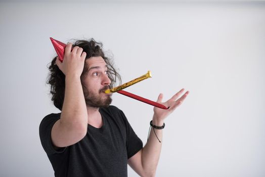 young man on party celebrating new year and dancing