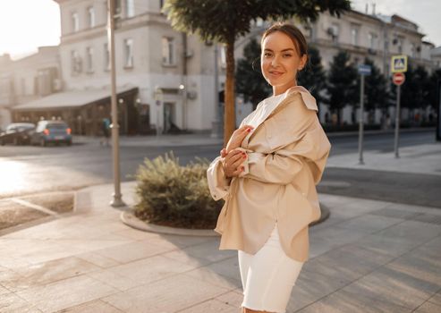 Portrait of a young fashion woman outdoors. High quality photo